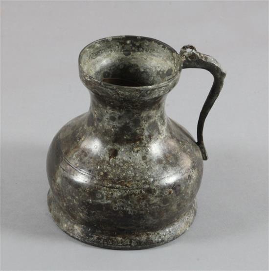 A 16th century Dutch or German pewter flagon, 9in., cover lacking